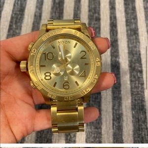 Gold Nixon watch MENS